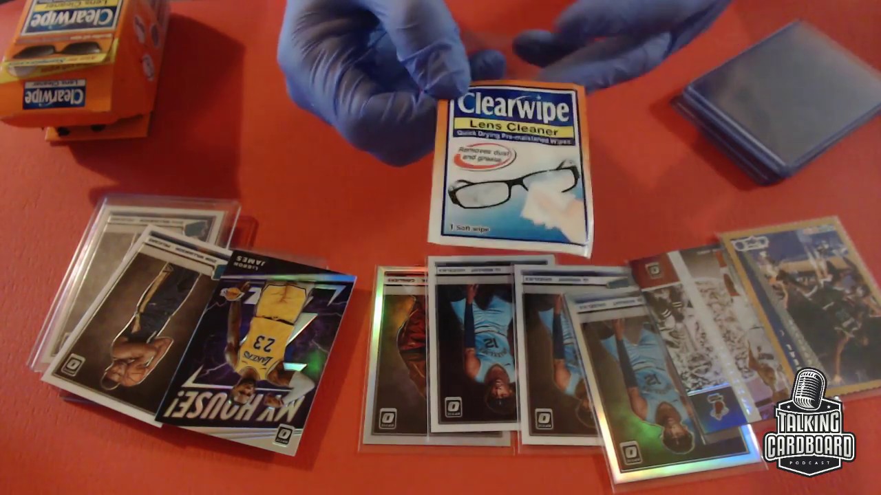 Cleaning sports cards for grading
