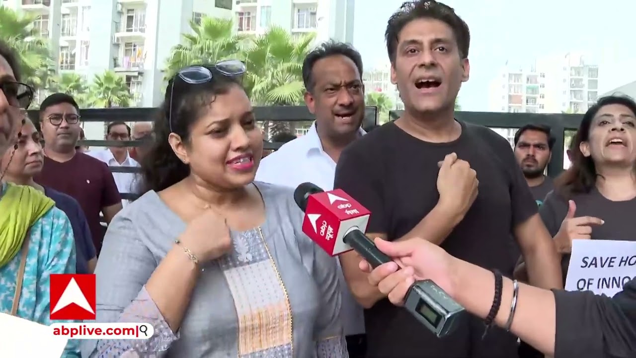 Noida Grand Omax Society: अवैध अतिक्रमण पर बुलडोजर चलाने के फैसले के खिलाफ उतरे लोग