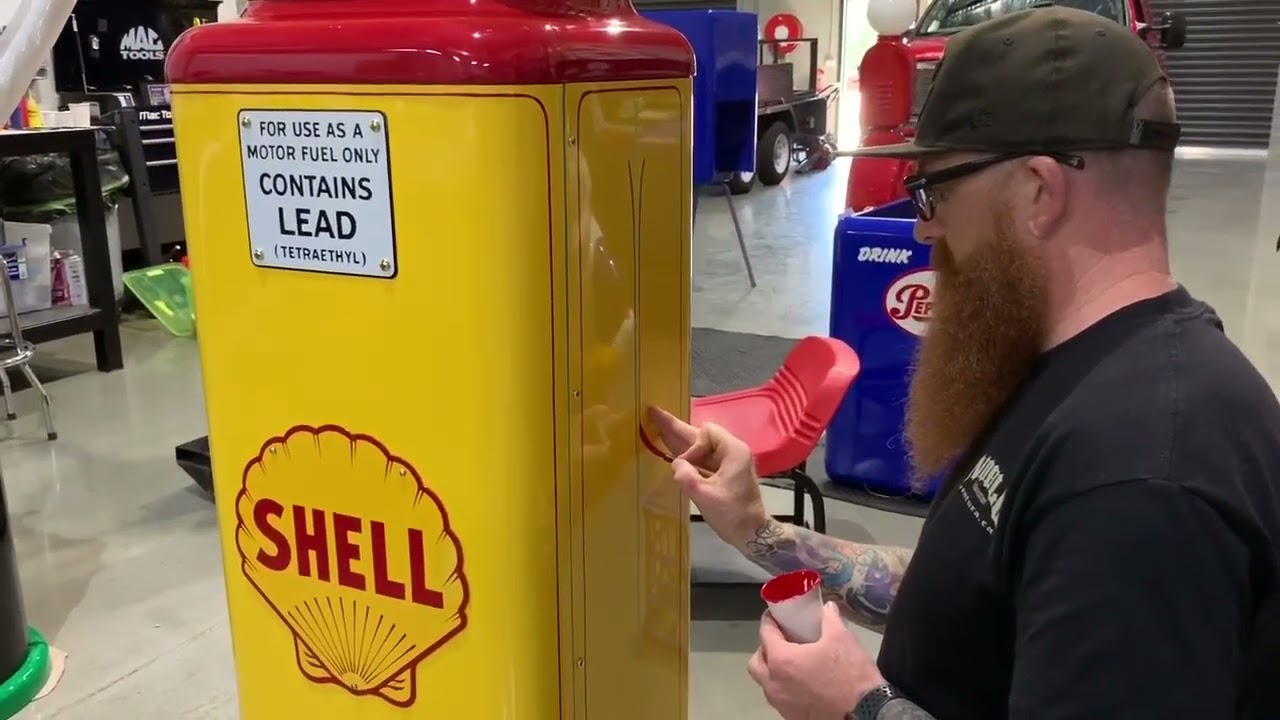 Vintage gas pump sign painting and striping