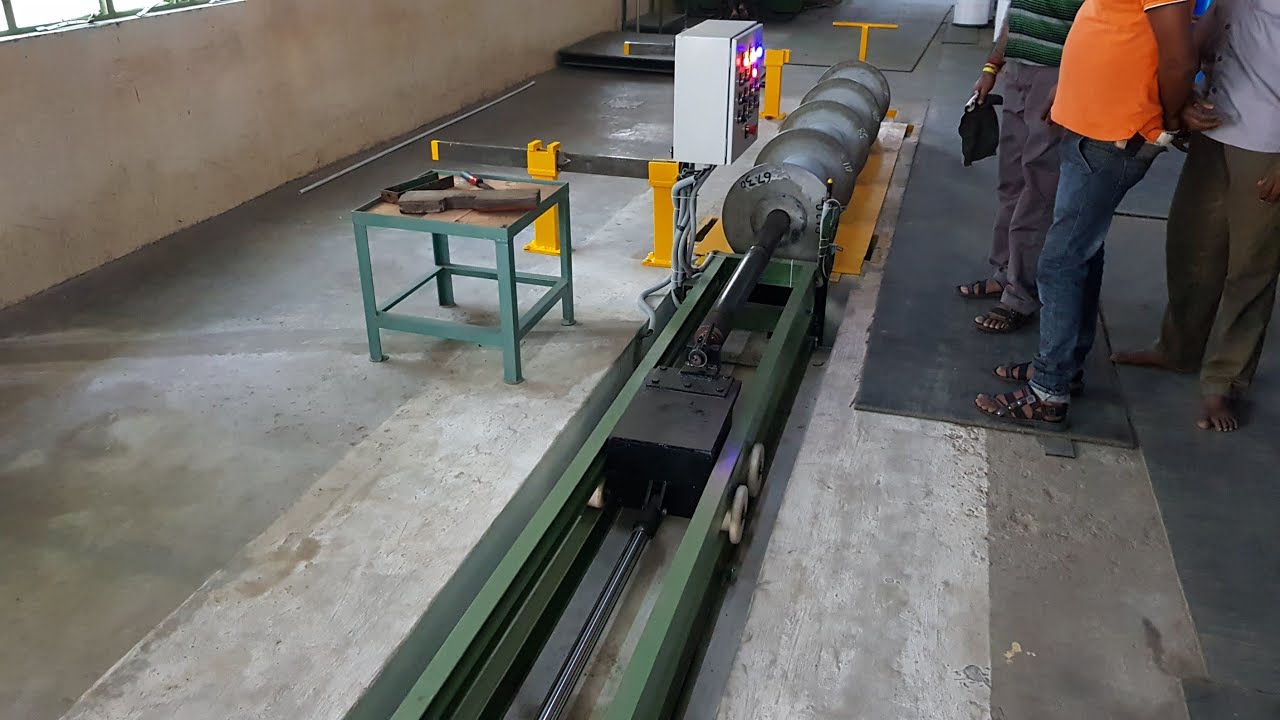 Hydraulic beam setting shaft removal(for knitting industry)by R.K.ENGINEERING WORKS