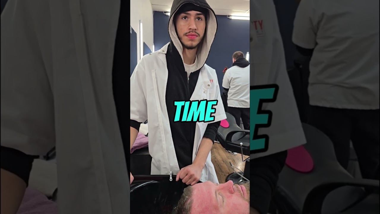 One of our students practicing the basic steps of a proper shampoo service.