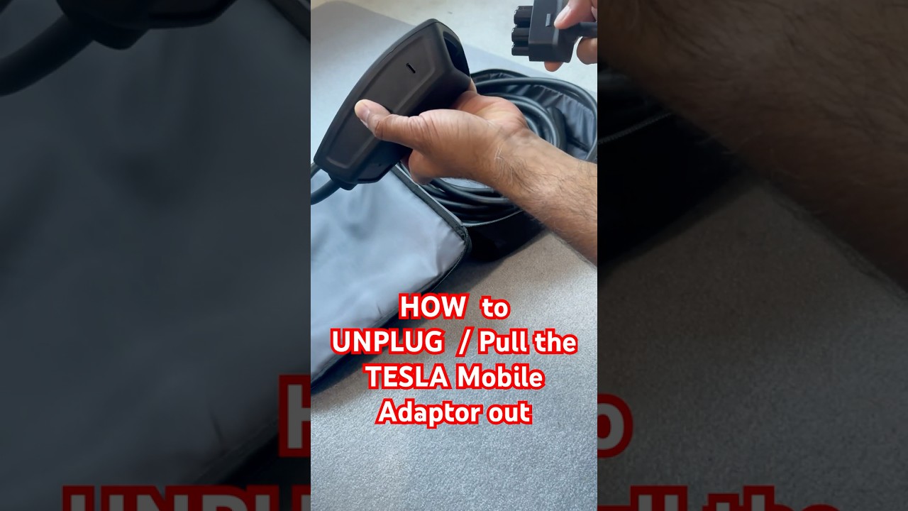 How to UNPLUG / Pull out the TESLA Mobile Charger ADAPTOR. #telsa #teslamobileadaptor #teslacharger