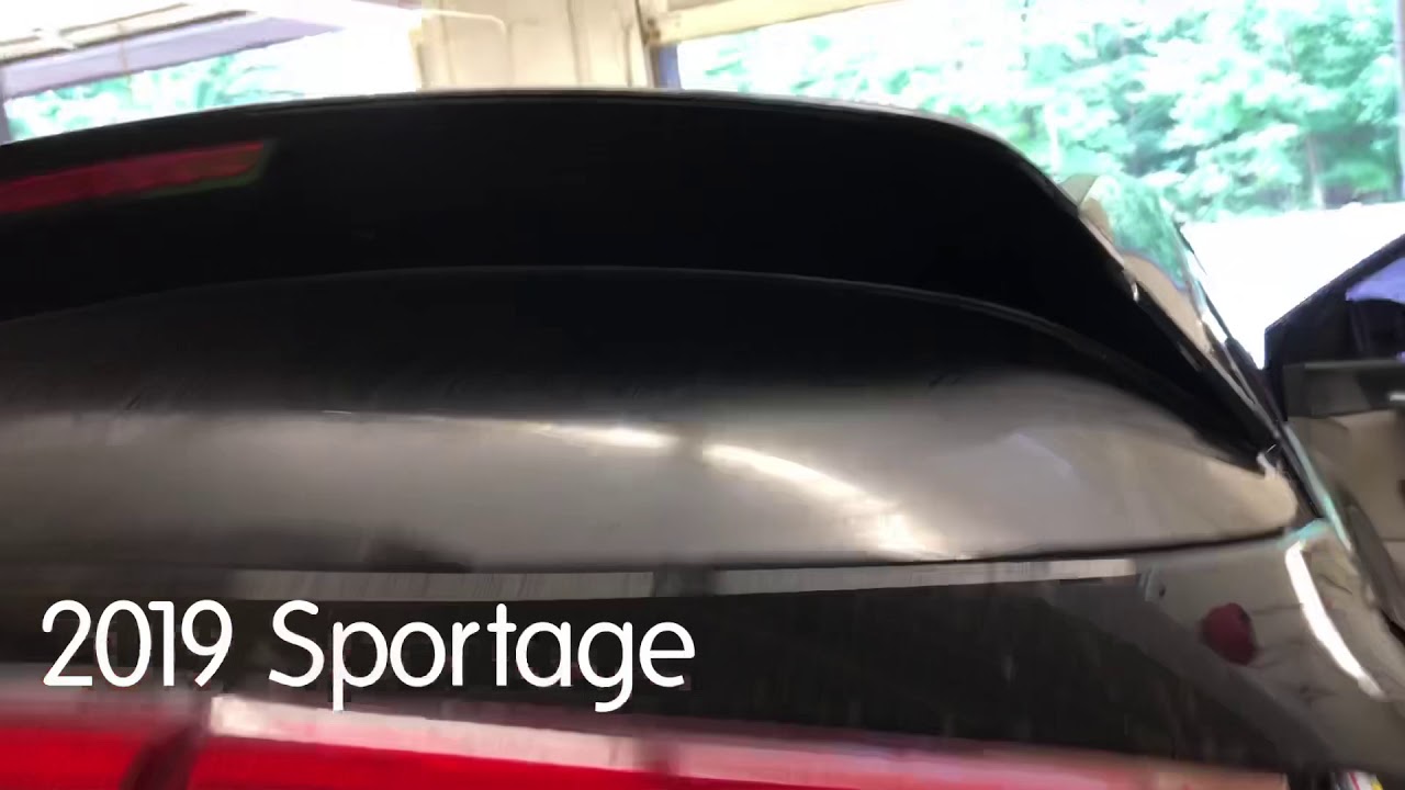 How to remove rear roof spoiler wing Kia Sportage
