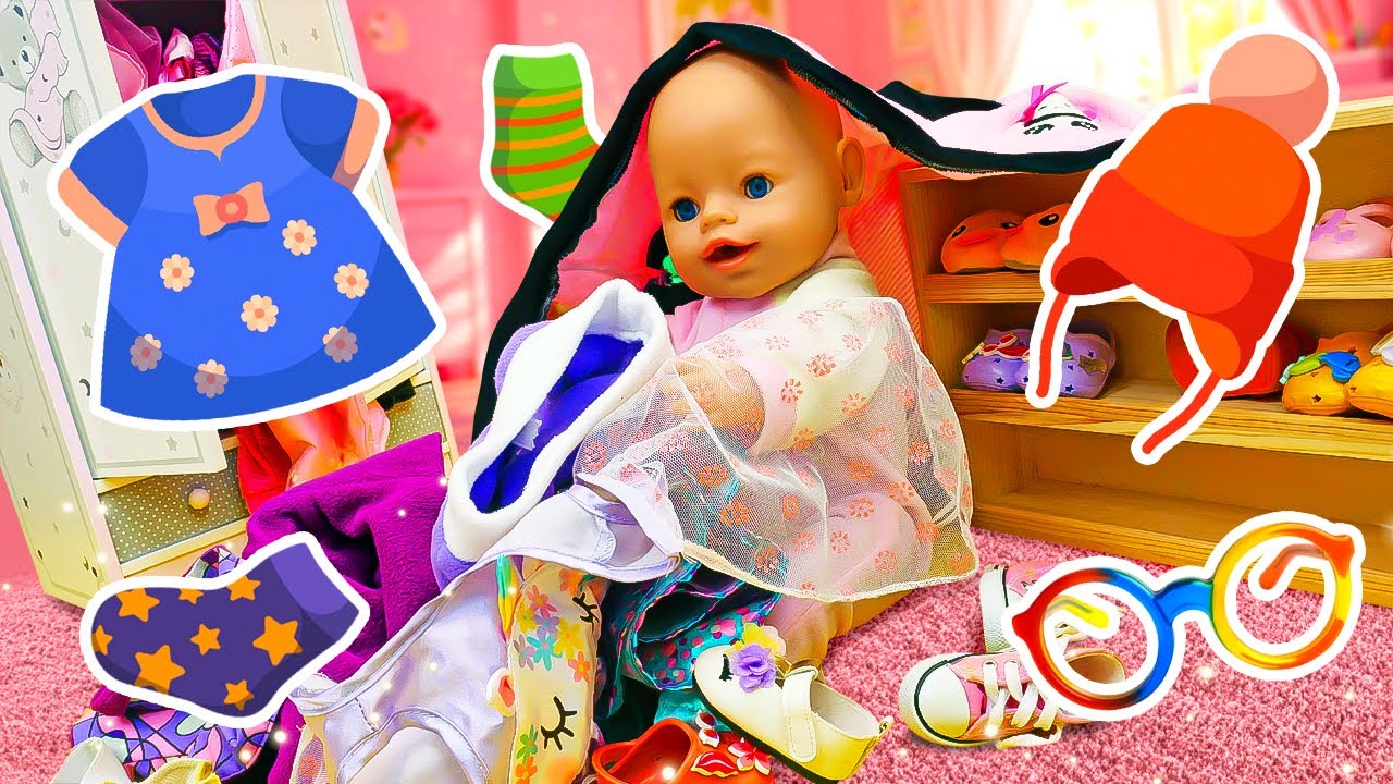 Baby Emily doll and Grace the babysitter put clothes and shoes in their places.