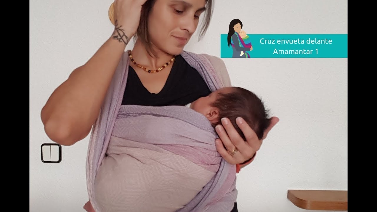 Cruz envuelta delante bebé. Amamantar versión 1