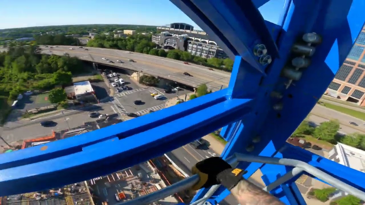 Climbing down my Linden comansa luffing jib tower crane 209 feet high￼￼￼￼