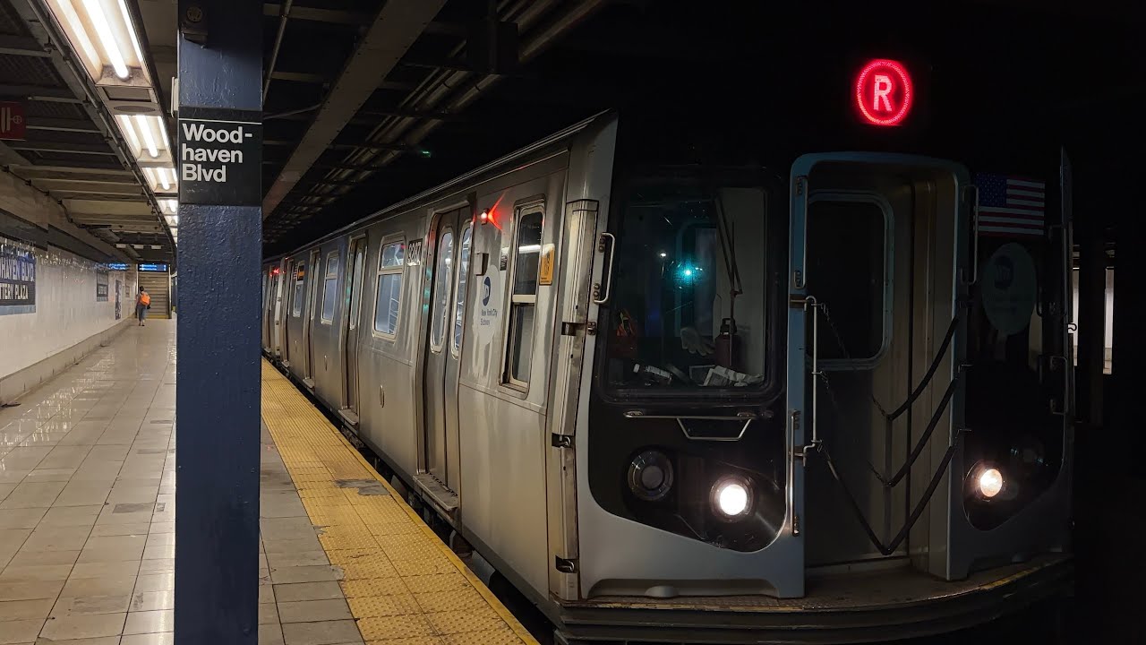 IND Queens Blvd: (M)(R) Lcl & Exp (E)(F) Trains @ Woodhaven Blvd