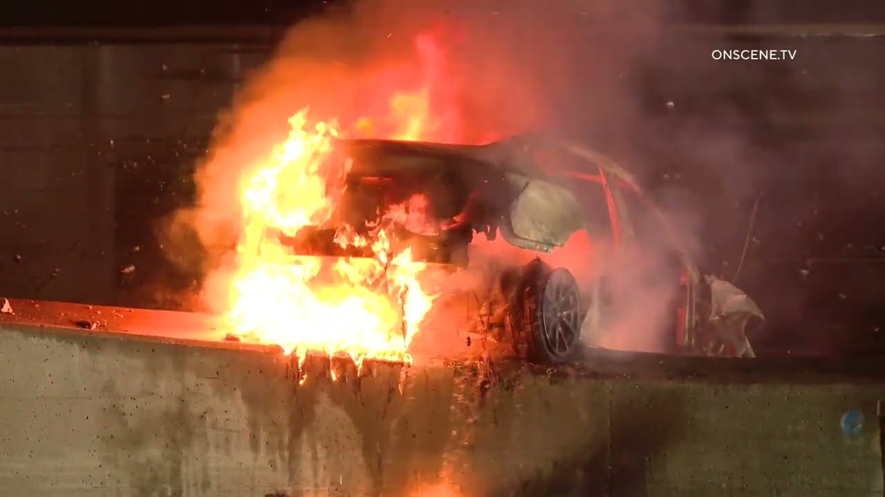 Tesla Flies Off Overpass Onto Freeway, Bursts Into Flames