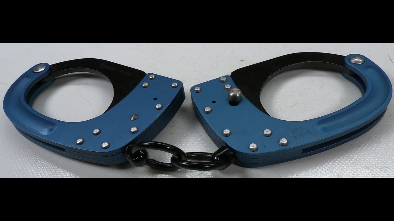 Rivolier Trainingshandschellen Modele 2006 blau Menottes Handcuffs Esposas Handboeien Bluegun Inox