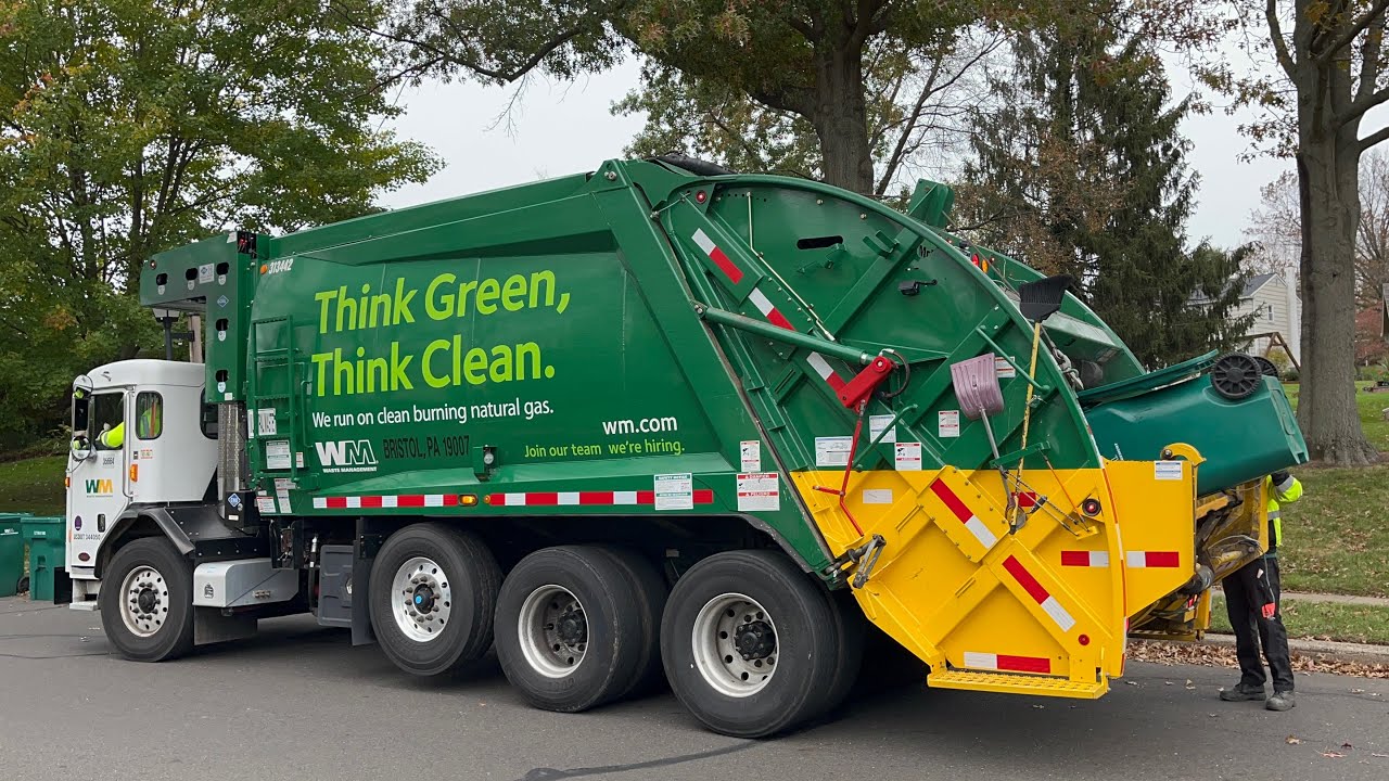 Waste Management Peterbilt 520 McNeilus rear loader on heavy trash