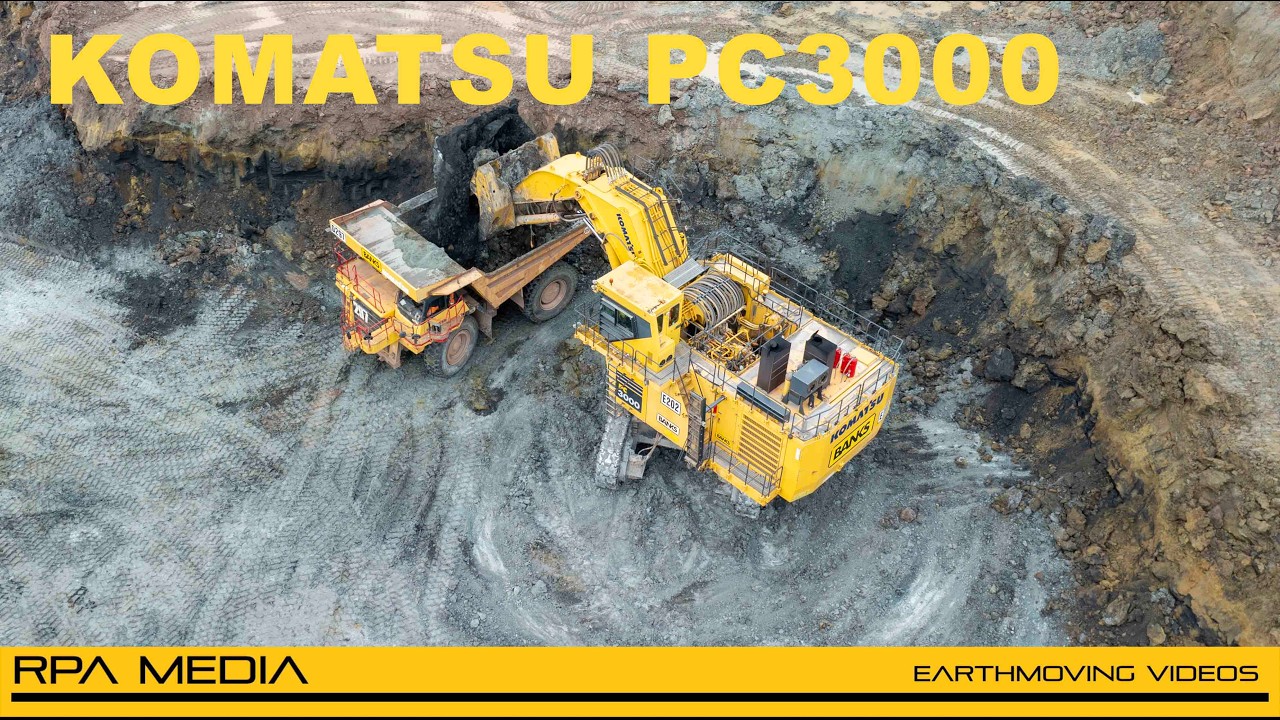 Komatsu PC3000 Face Shovel and Excavator Loading CAT 777F Trucks