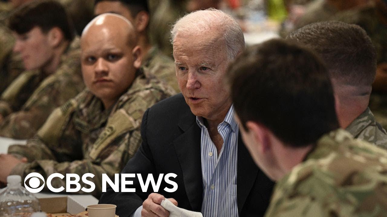 Biden visits troops in Poland near Ukraine's border and gets humanitarian briefing