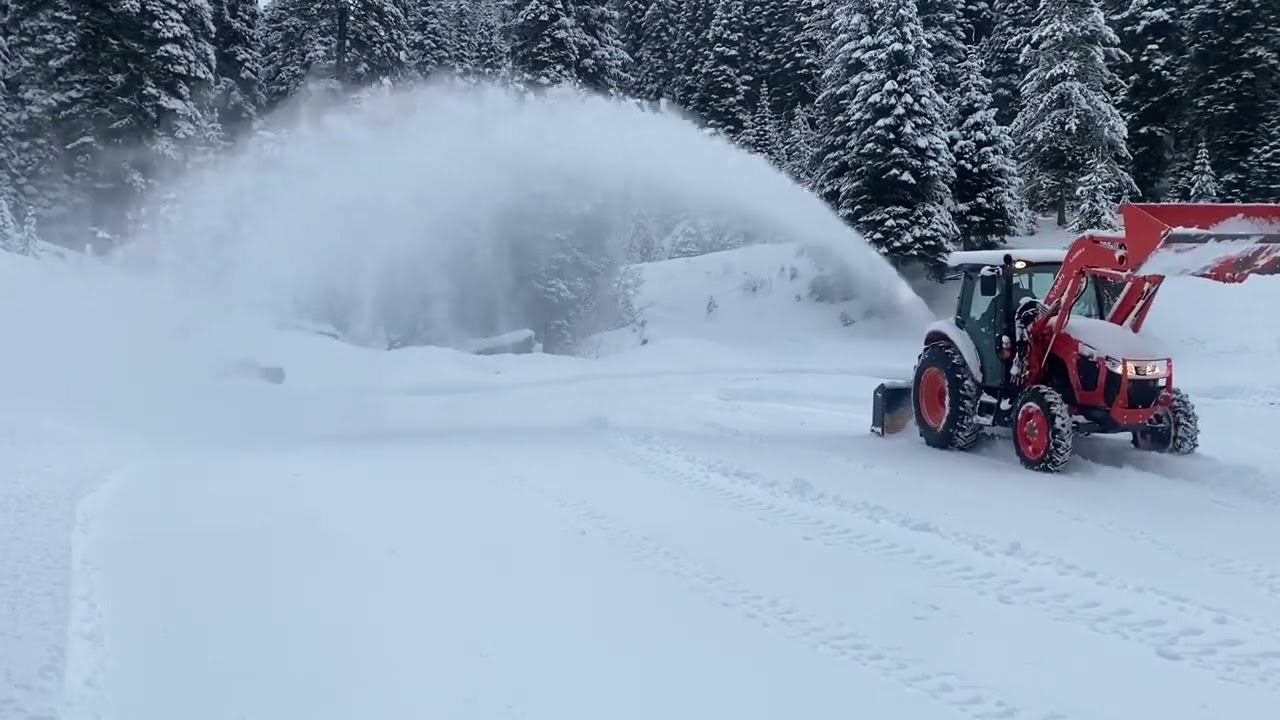Erskine 825RP inverted snowblower and Kubota M5-111 Tractor.