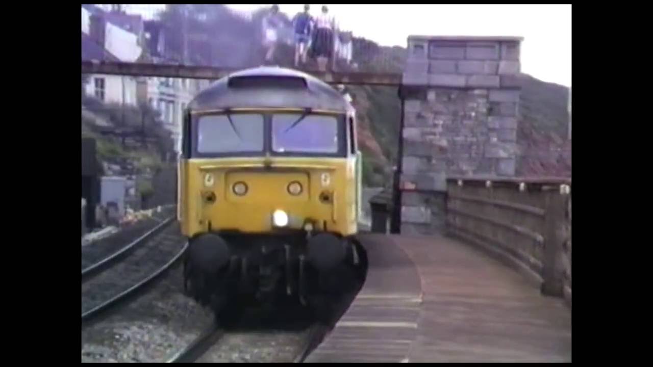 Two 47s pass through Dawlish Station.1986.