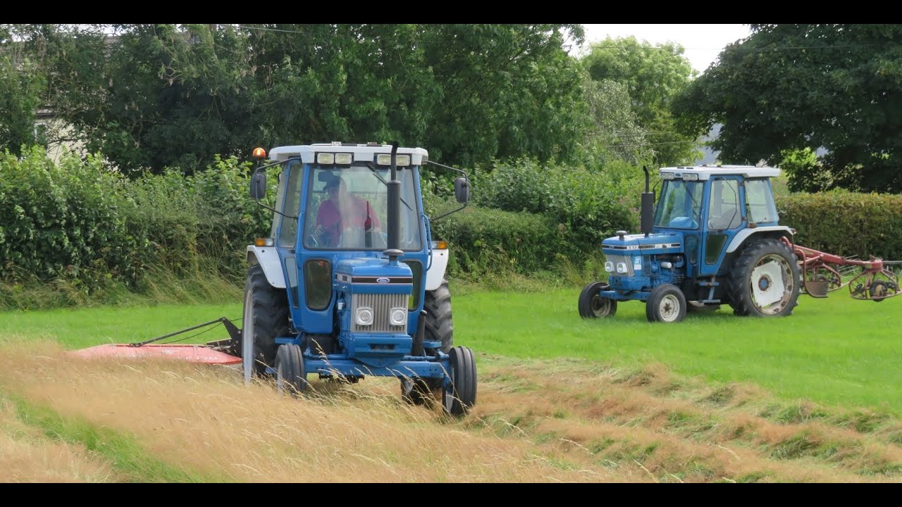 2 Ford 6610's Mowing and Tedding Grass