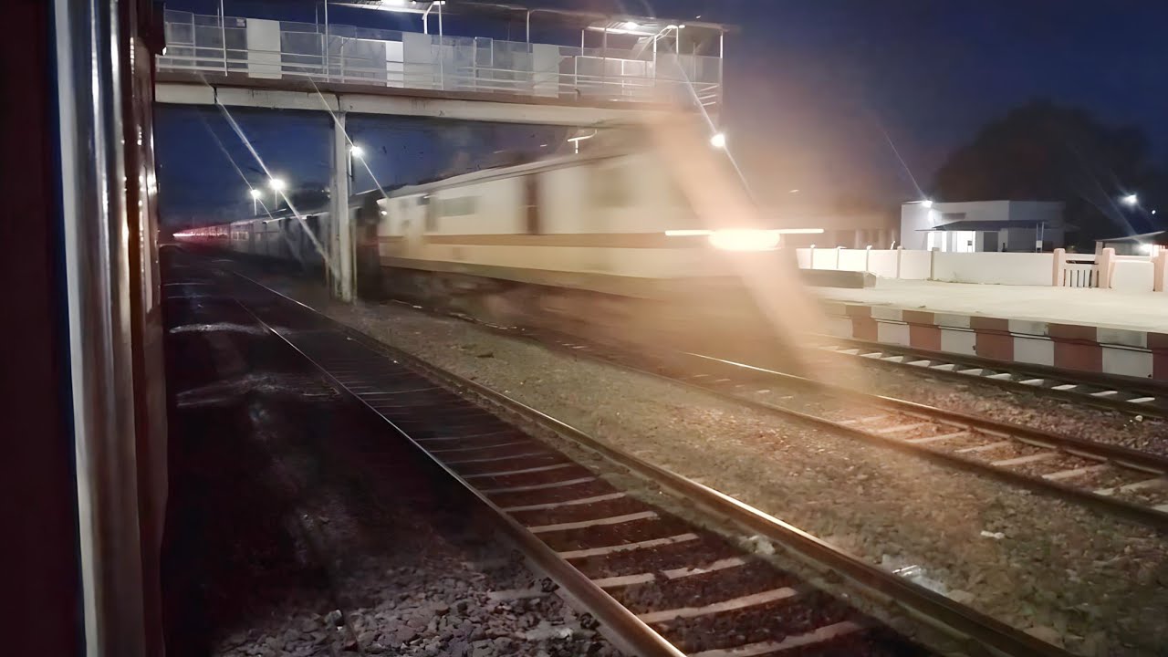 High Speed Train Crossing At Karpurigram Station