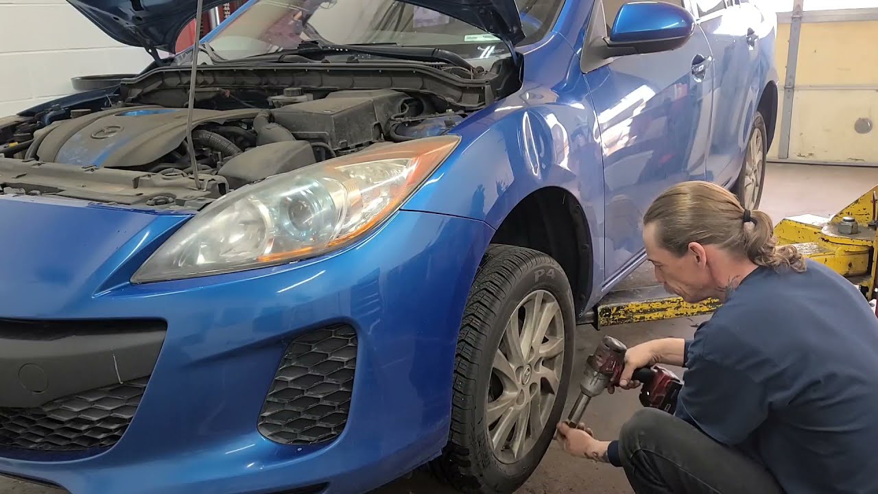 Front Strut Assemblies on a 2012 Mazda 3