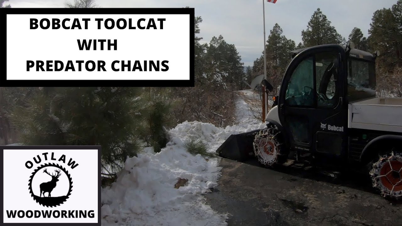 BOBCAT TOOLCAT WITH PREDATOR CHAINS