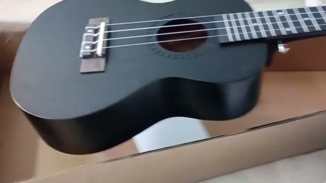 Small guitar ukulele unboxing video ukulele for kids