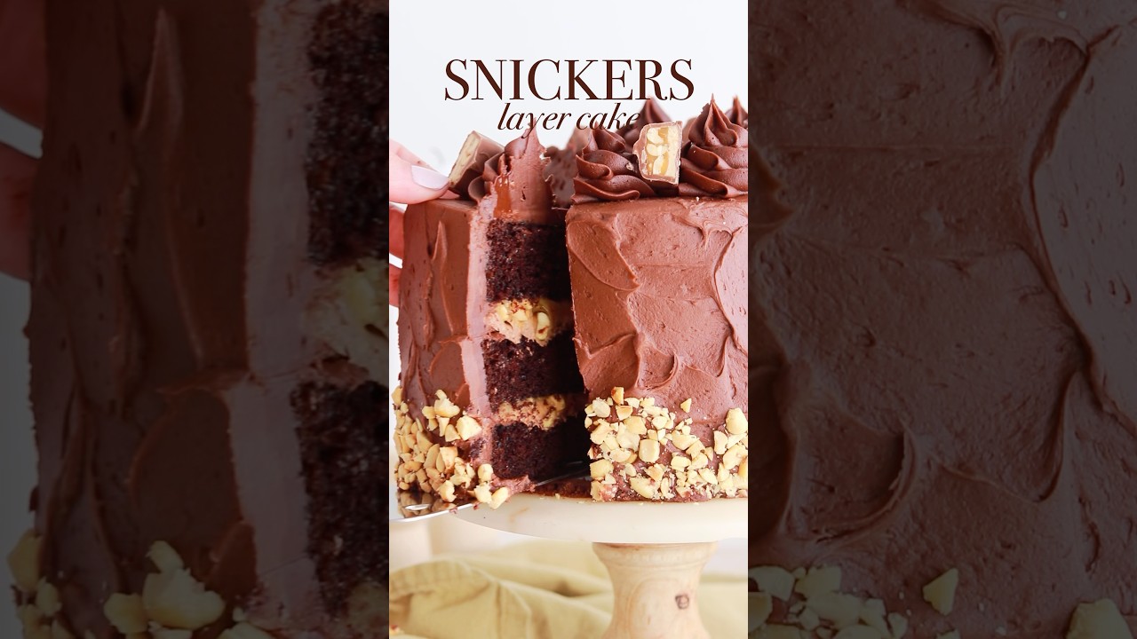 This Snickers cake with nougat + peanut caramel filling is my fave flavor thus far! #cake #snickers