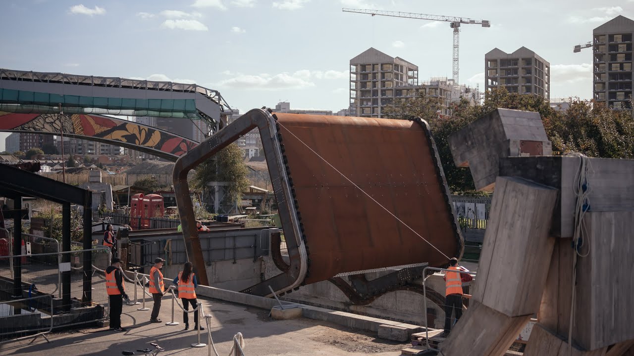 Thomas Randall-Page completes rolling bridge at Cody Dock in London