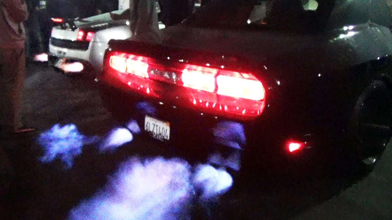 BACKFIRE BATTLE: Lamborghini vs Dodge Challenger