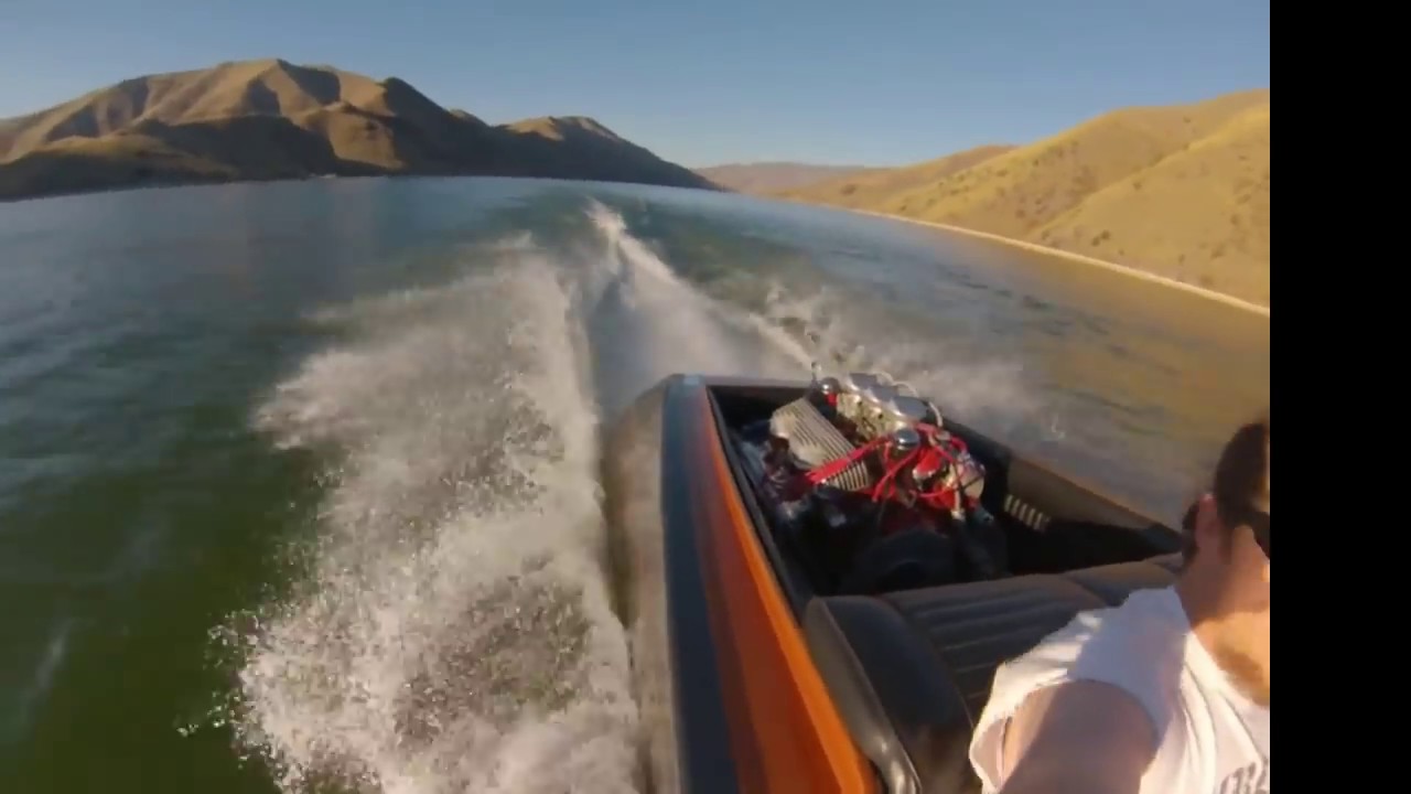 Fast 51 year old flat bottom woody v-drive boat restored and repainted