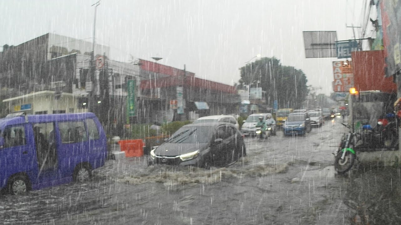 Rain floods my village submerging vehicles