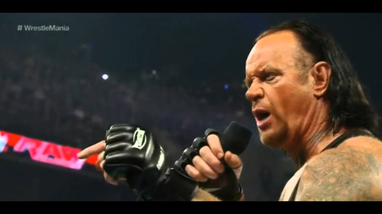 SHANE O`MAC BURST OPENED THE UNDERTAKER WITH AN ELBOW DROP