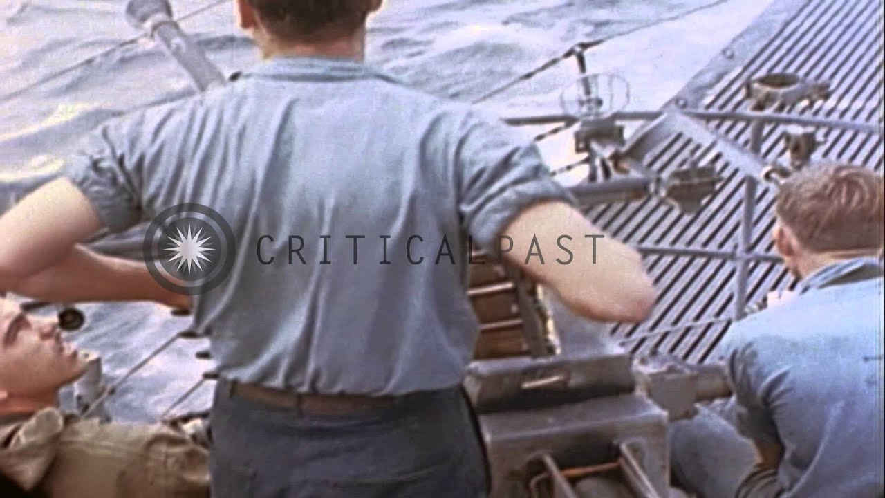 US submarine picks up Japanese survivors from boat disabled by its gunfire in Wor...HD Stock Footage