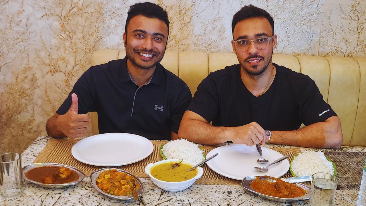 Trying Egg Curry Rice with Dal Fry in India