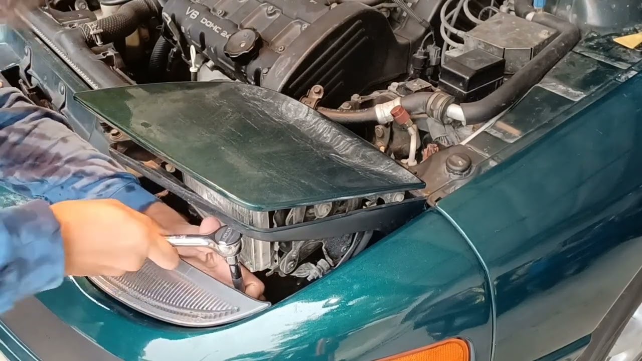 How to Replace a Pop-up Headlight Assembly on a 1993 Mitsubishi 3000gt SL
