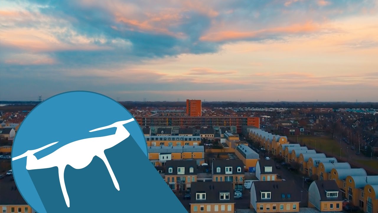 Blixembosch setting sun by drone (4k) - Eindhoven, The Netherlands