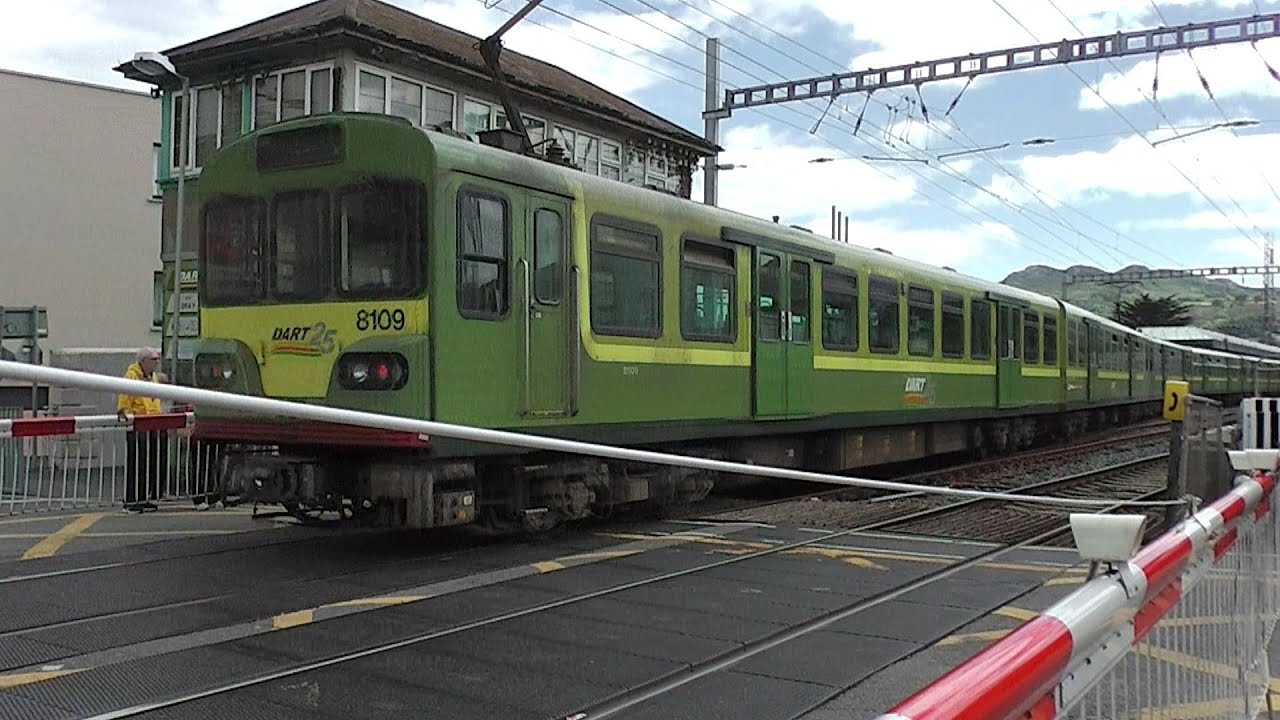 Level Crossing at Bray Station - Dart Trains number 8109 and 8130