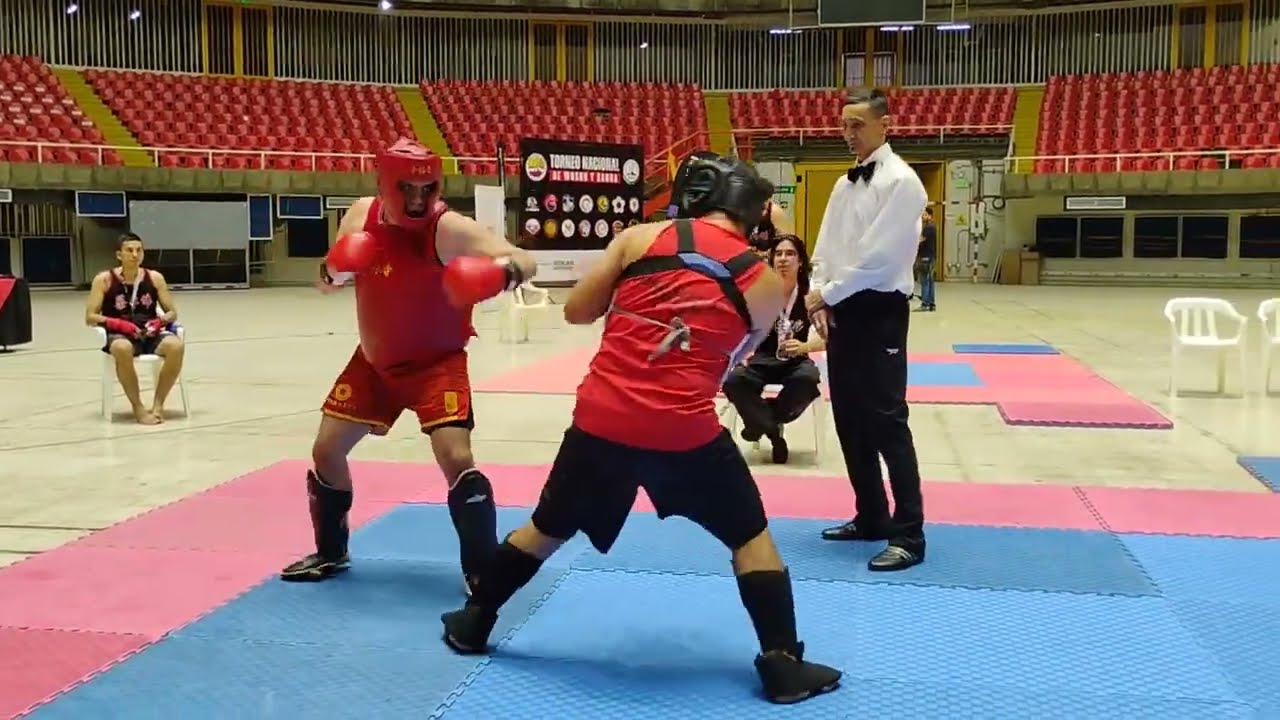 Second round Sanda semifinal in a Chan Family Choy Lee Fut Sanda tournament 