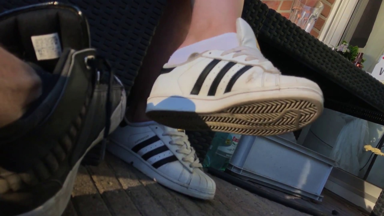 Girlfriends Adidas Superstars dangling