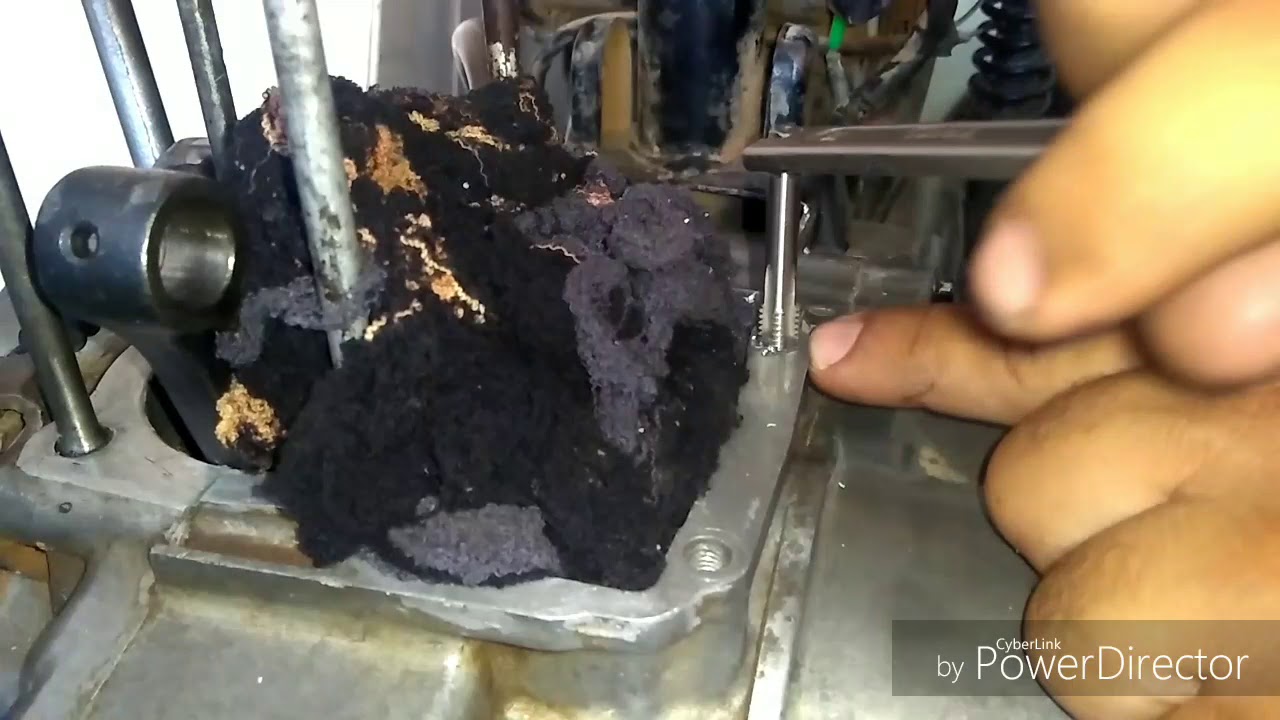 Retificando rosca esplanada no motor da Titan 125 99