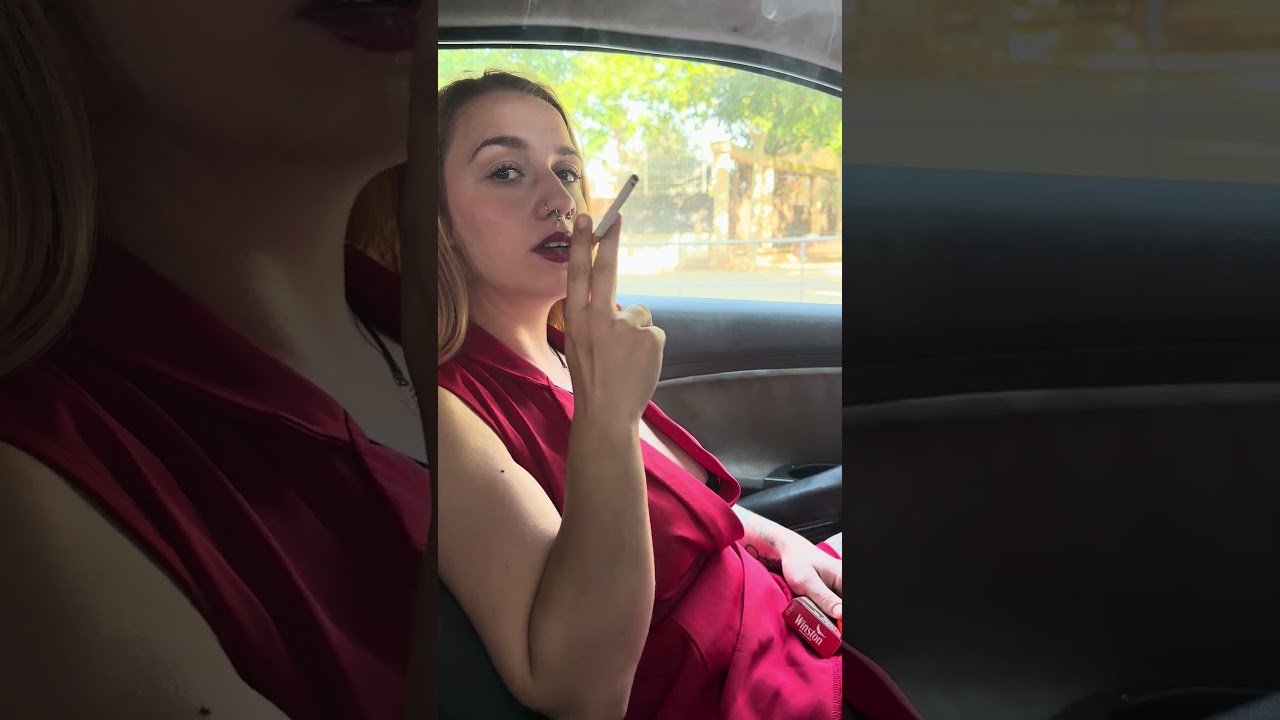 Hotbox in car smoking cigarette