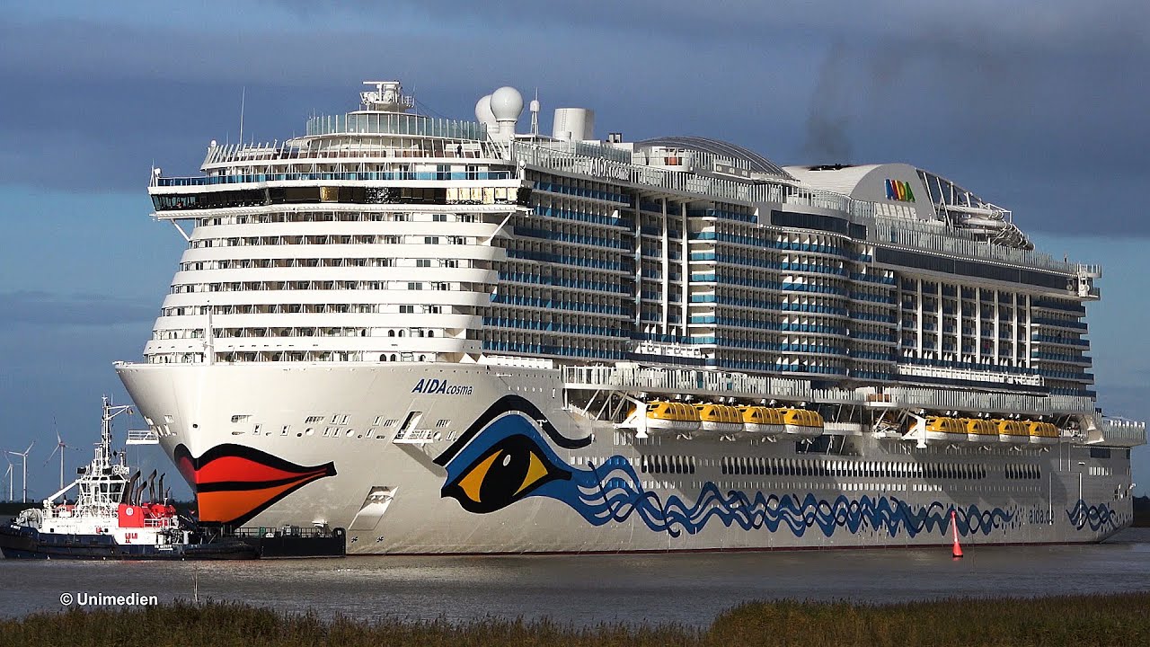 AIDAcosma | worlds most spectacular conveyance of a giant cruise ship over a small river | 4K-Video