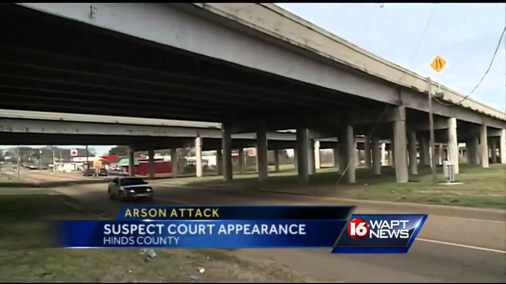 Woman accused of setting 2 people on fire