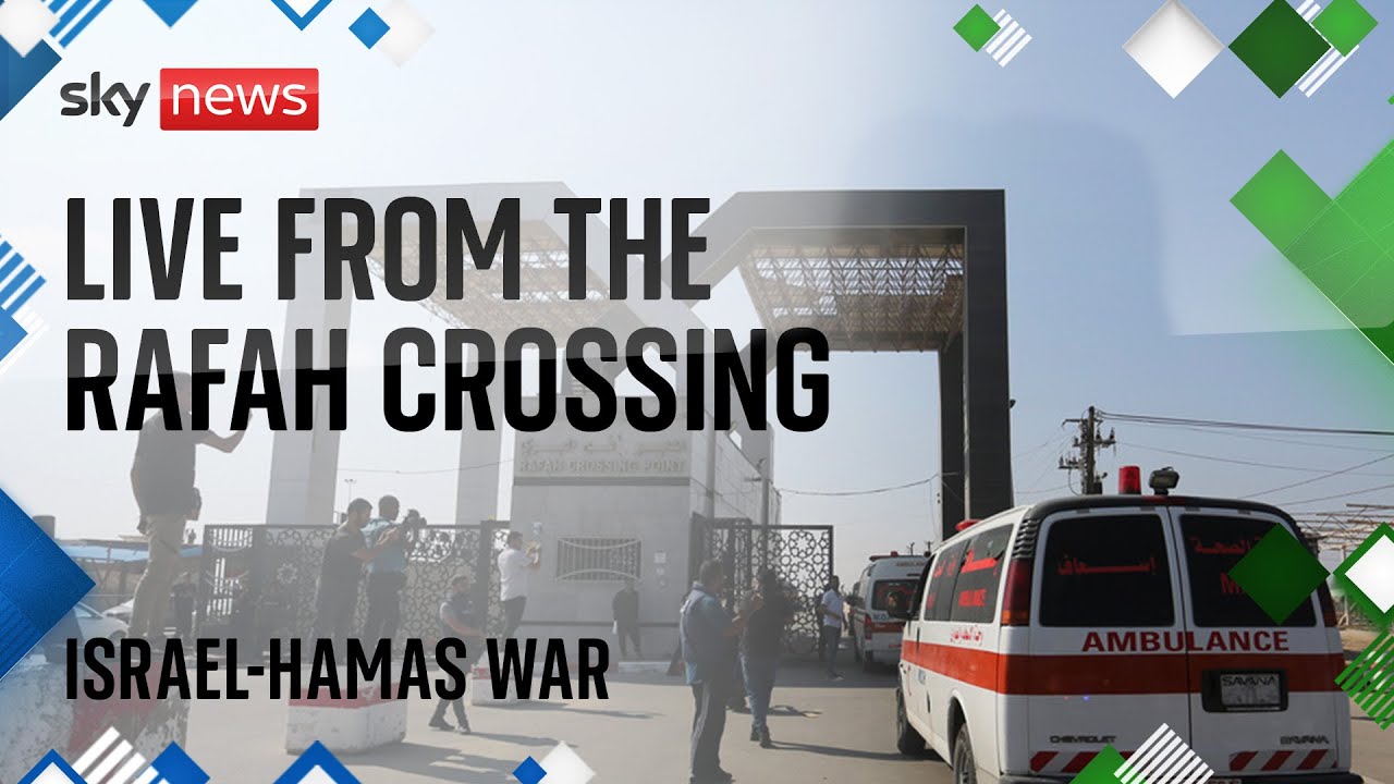 Trucks prepare to be loaded with aid at Rafah crossing as Israel and Hamas pause fighting
