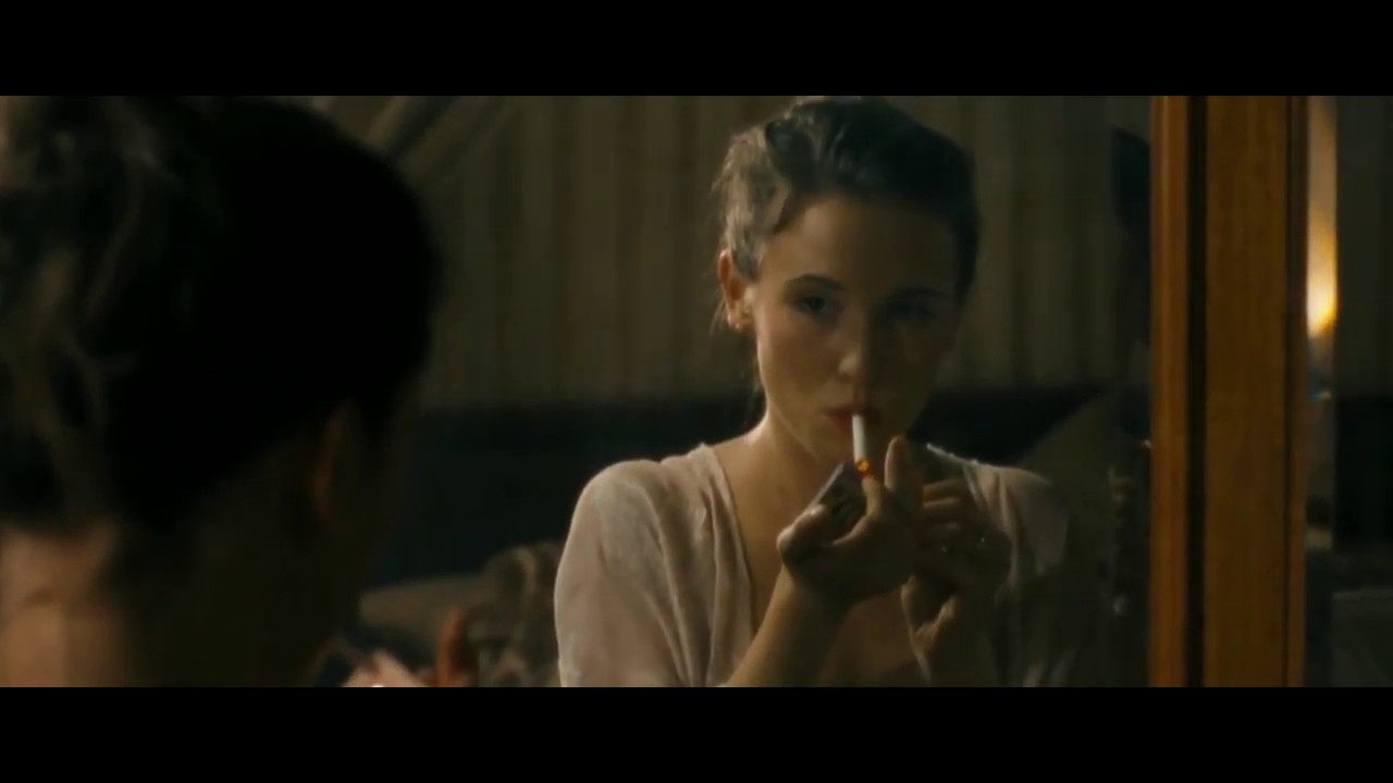 Peri Baumeister smoking cigarette