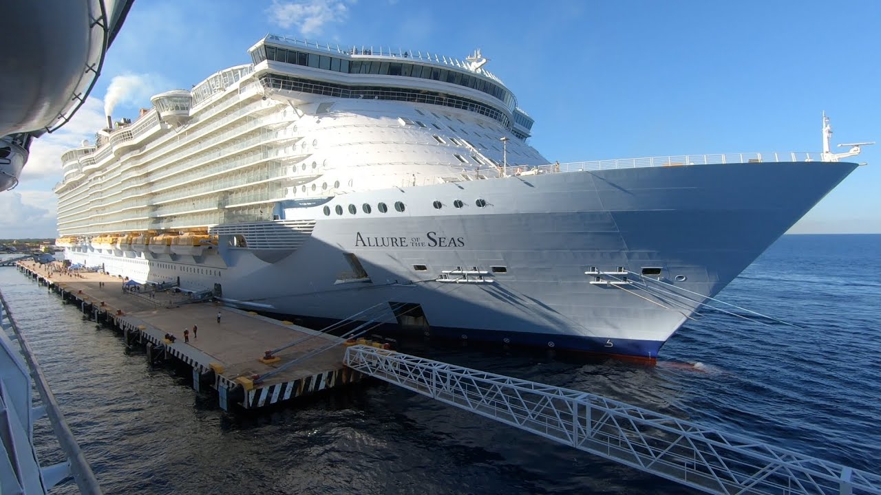 GRANDEUR OF THE SEAS, DOCKS NEXT TO ALLURE OF THE SEAS IN COZUMEL