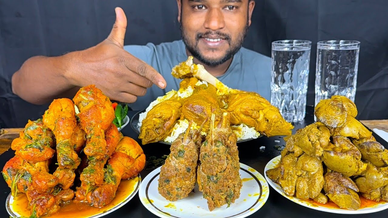 Chicken leg piece curry, Mutton kabab,  chicken liver curry and mutton leg curry with rice eating 
