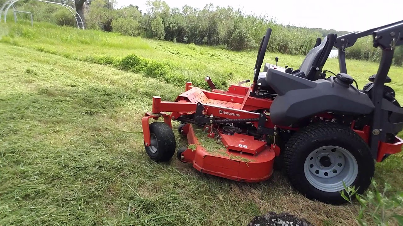 overgrown field 3ft tall husqvarna zero turn
