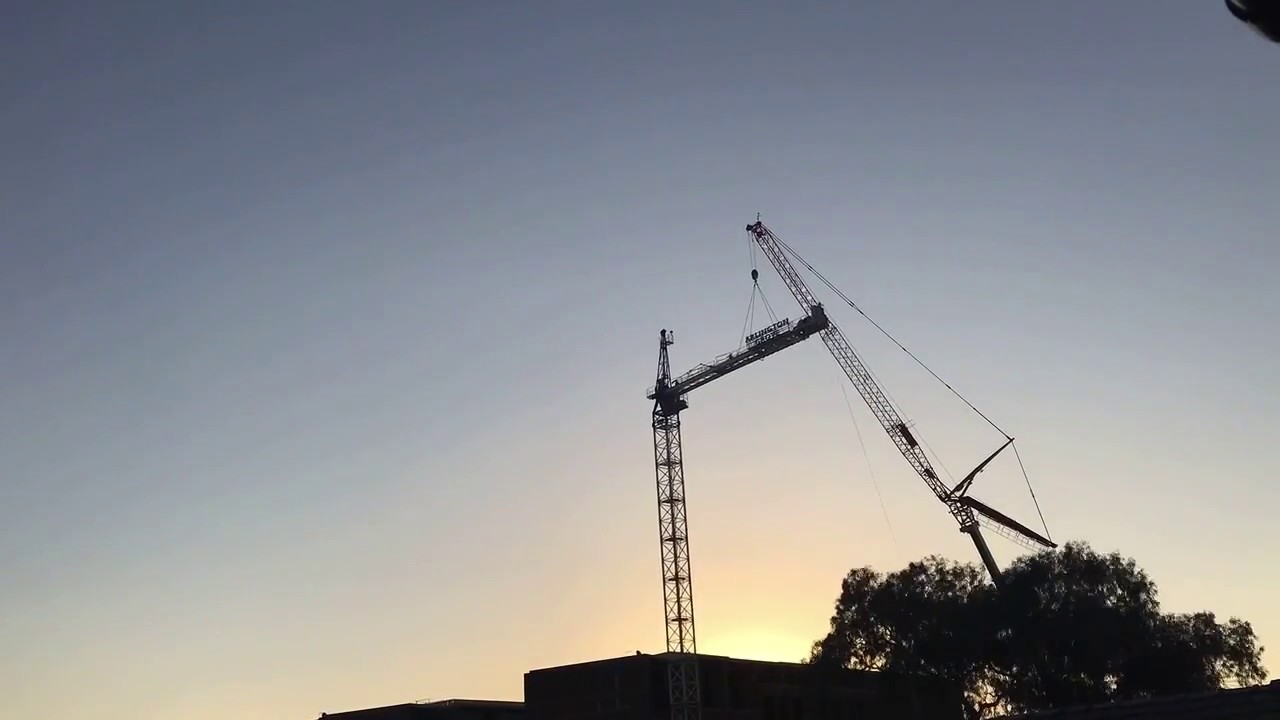 Large Tower Crane Disassembly: 2 day time-lapse with sunset