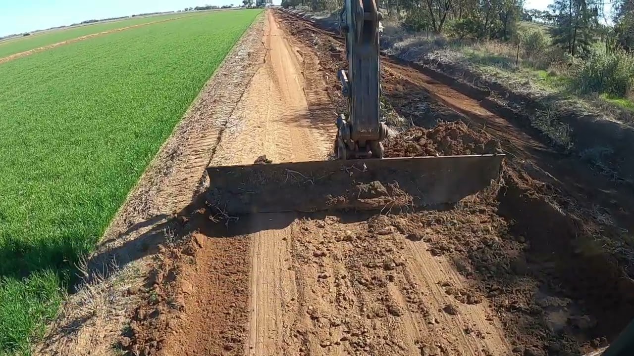 12ft blade attachment on excavator cleaning more drains