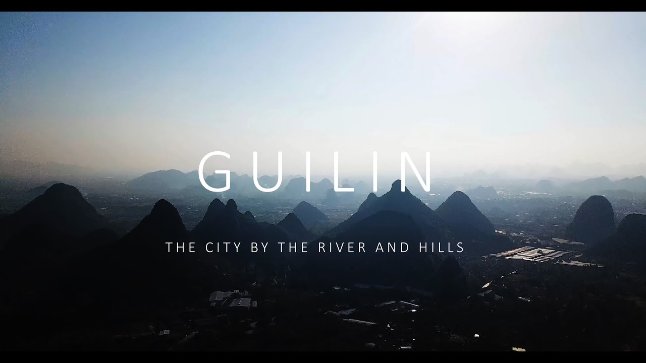 GUILIN - THE CITY BY THE RIVER AND HILLS. Drone Shot.
