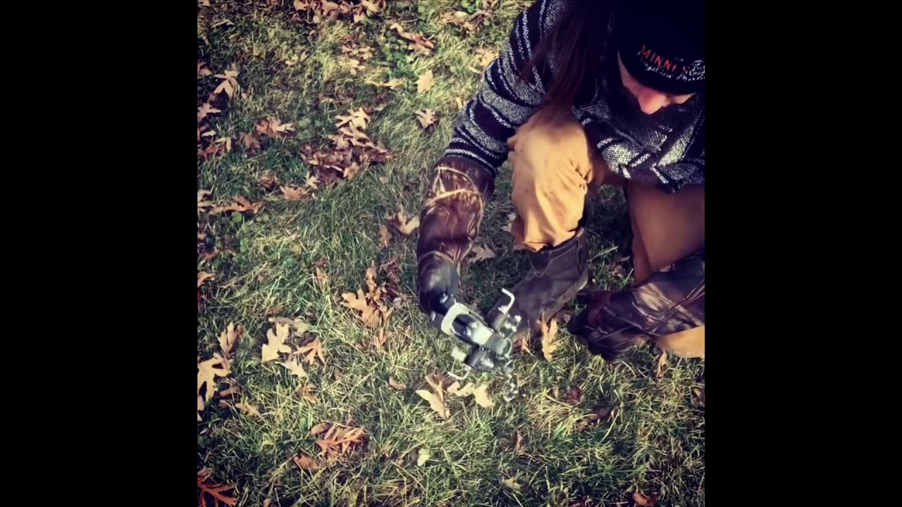 Putting hand in Mb750 beaver trap