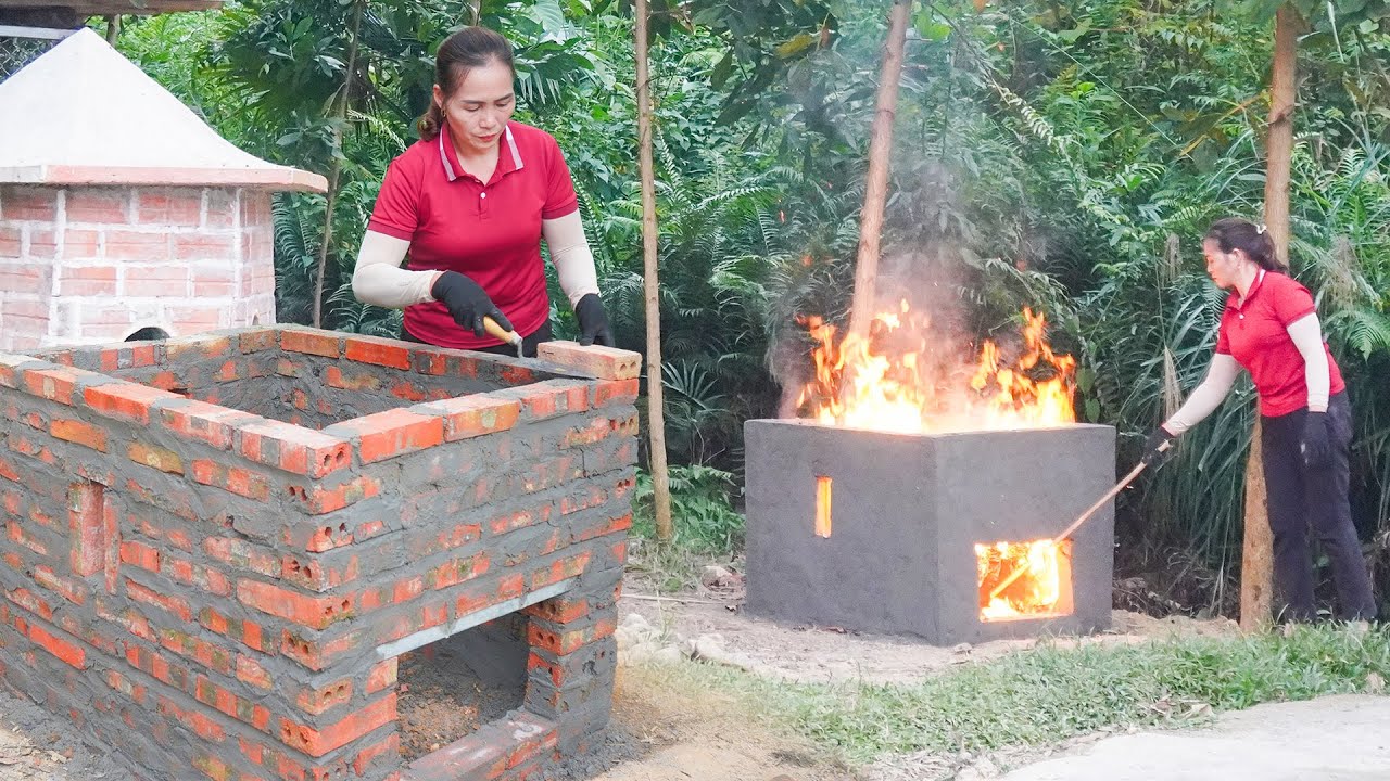 Woman building a brick and cement incinerator - Build a clean farm | Dien Tieu Van